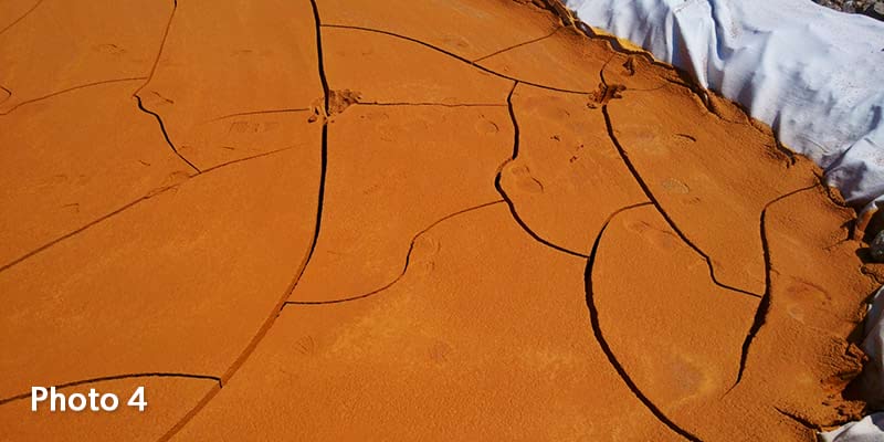 Photo 4 - Test site after day 10, showing cracks and footprints