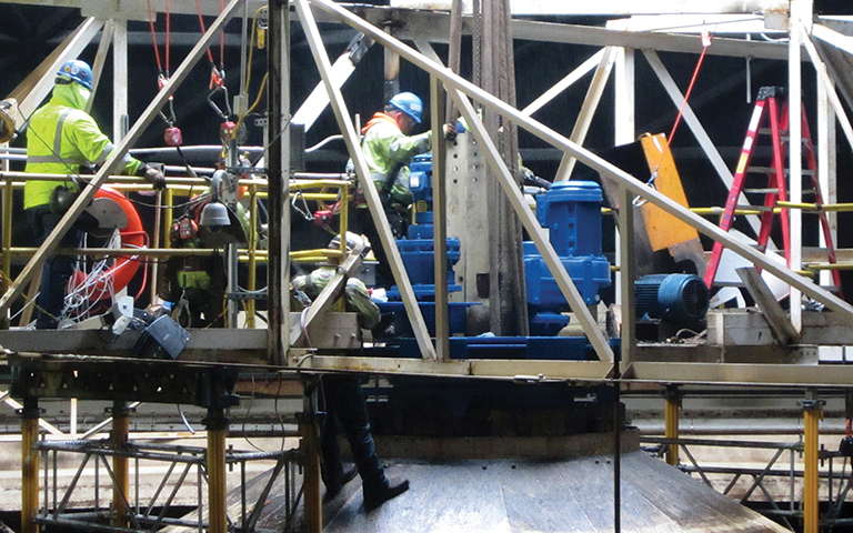 Dual-cage drive retrofit at paper mill